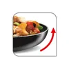 A close-up view of food being cooked in a pan, with a red arrow indicating movement. Produktbild-Vorschau