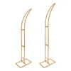 Two gold metal stands with curved tops, presented against a white background. Podgląd zdjęcia produktu