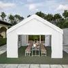A white party tent set up in a backyard with picnic tables and benches inside. Produktbild-Vorschau