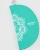 A teal colored pouch with a white mandala pattern and text. Produktbild-Vorschau