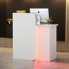 A modern reception desk with LED lighting in a business or salon setting. Náhľad obrázku produktu