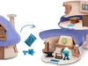 A toy playset with Smurf figures and accessories, shown in an open and closed configuration. Anteprima dell’immagine prodotto