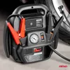 A black car jump starter with red clamps and a pressure gauge is shown in a close-up shot. Podgląd zdjęcia produktu