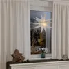 A white star-shaped lamp hangs in a window on a rainy day, with decorative stars and balls on the windowsill. Produktbild-Vorschau