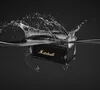 A Marshall speaker is submerged in water, creating a splash. Produktbild-Vorschau
