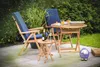 A garden setting with teak furniture, drinks, and a decorative sheep. Produktbild-Vorschau