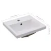 A white ceramic sink with dimensions indicated by measurement lines and text. Produktbild-Vorschau