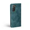 A teal flip case for a smartphone is shown against a white background. Produktbild-Vorschau