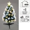 A decorative fiber optic Christmas tree with a star on top, displayed on a stand. To the right are icons indicating indoor use, 8 functions with memory, and IP20/GS certification. Náhľad obrázku produktu
