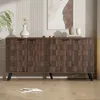 A dark wood sideboard with a textured front is displayed in a well-lit room with a plant and artwork in the background. Produktbild-Vorschau