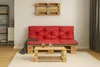 A living room setting with a pallet sofa and coffee table. Produktbild-Vorschau