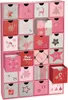 A pink advent calendar with 24 small drawers, each decorated with Christmas-themed designs and numbers. Náhled obrázku produktu