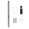 A set of stylus pen accessories, including a stylus pen, a tip tweezers, a cleaning brush, and replacement tips. Produktbild-Vorschau