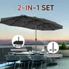 An outdoor dining set with a large gray umbrella, set against a backdrop of water and distant hills. Produktbild-Vorschau