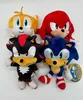 A group of four Sonic the Hedgehog character plush toys arranged on a white background. Produktbild-Vorschau