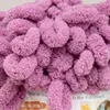 A close-up view of fluffy pink yarn. Náhled obrázku produktu