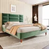 A bedroom with a green velvet bed. Produktbild-Vorschau