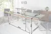 A dining room scene with a large table and chairs, featuring dimensions indicated by text overlays. Produktbild-Vorschau