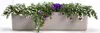 A planter box filled with plants. Náhled obrázku produktu