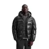 A man wearing a black puffer jacket. Produktbild-Vorschau