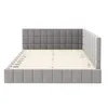 A grey upholstered bed frame with a slatted mattress base, shown from the side. Produktbild-Vorschau