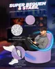 A man is sitting on a large purple beanbag chair in a dimly lit room with neon blue accents. Produktbild-Vorschau