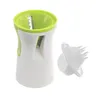 A white and green vegetable spiralizer with a separate white attachment, shown against a white background. Náhled obrázku produktu