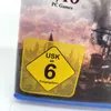 A close-up of a video game case with a rating sticker. Produktbild-Vorschau