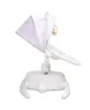A side view of a white baby swing with a purple canopy and a small stuffed toy hanging from it, set against a white background. Produktbild-Vorschau