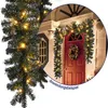 A decorated doorway with a Christmas garland and wreath. Produktbild-Vorschau