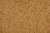 A close-up, top-down view of a pile of small, light brown granules. Produktbild-Vorschau