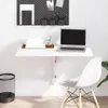 A white wall-mounted folding desk with a laptop, papers, and a chair. Podgląd zdjęcia produktu