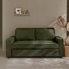 A green sofa is shown in a room with a patterned wall and decorative elements. Anteprima dell’immagine prodotto