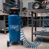 A workshop or garage setting with tools and workbenches. Produktbild-Vorschau