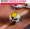 A close-up of a quail egg being opened with a special tool, with the yolk dripping out. Produktbild-Vorschau