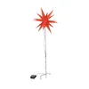 A red star-shaped garden stake light with a black pole and base. Produktbild-Vorschau