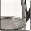 A close-up view of a glass kettle showing the water level markings. Produktbild-Vorschau