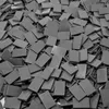 A pile of dark gray LEGO tiles. Produktbild-Vorschau