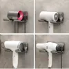 A collage of four images showing different hair dryers mounted on a wall holder. Produktbild-Vorschau