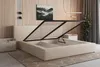 A bedroom scene with a bed frame open to reveal storage space. Produktbild-Vorschau