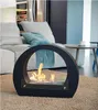 A modern living room with a sofa, coffee table, and a bioethanol fireplace. Náhled obrázku produktu