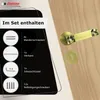 A door handle set is shown on a wooden surface, with a black overlay detailing the contents of the set. Produktbild-Vorschau