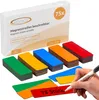 A product shot of colorful magnetic strips with a box in the background and a hand writing on one of the strips. Produktbild-Vorschau