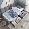 A child's bed with storage drawers, showing folded clothes. Anteprima dell’immagine prodotto
