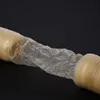 A close-up shot of a natural collagen casing, likely for sausage making, stretched between two ends of the casing. Náhled obrázku produktu