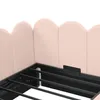 Close-up of a pink upholstered bed frame with a black metal support structure. Produktbild-Vorschau