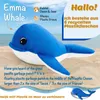 A plush whale toy is shown on a sandy beach with a blue ocean and sky in the background. Text overlays provide information about the product and its environmental mission. Produktbild-Vorschau