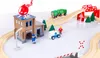 A toy wooden train set with a police station, helicopter, bridge, and various accessories. Náhled obrázku produktu