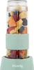 A close-up studio shot of a portable smoothie maker filled with fruit. Produktbild-Vorschau
