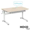 A height-adjustable desk with a light wood top and white legs, shown in a studio setting against a white background. Produktbild-Vorschau